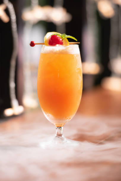 tequila sunrise - orange cocktail stock pictures, royalty-free photos & images