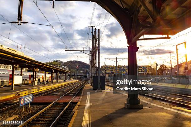 st gallen railroad station in sunset - st gallen stock pictures, royalty-free photos & images