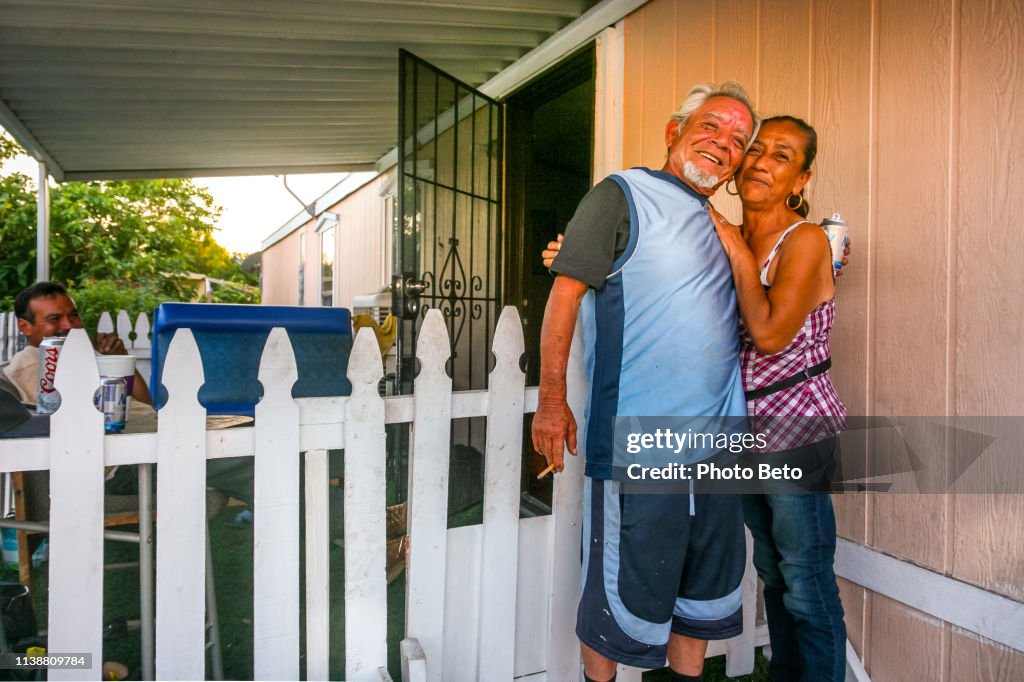 A couple of Mexican immigrants in front of their home in San Bernardino in Southern California