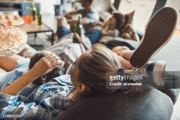 resting at home after a party! - after party living room stock pictures, royalty-free photos & images