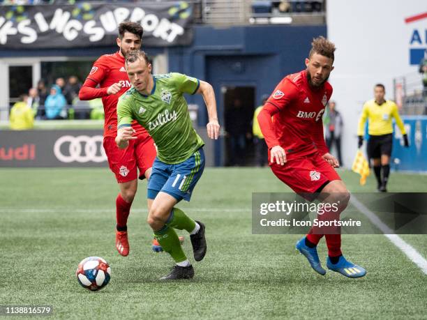 Seattle Sounders defender Brad Smith dribbles the ball down field during the MLS regular season match between Toronto FC and Seattle Sounders FC on...