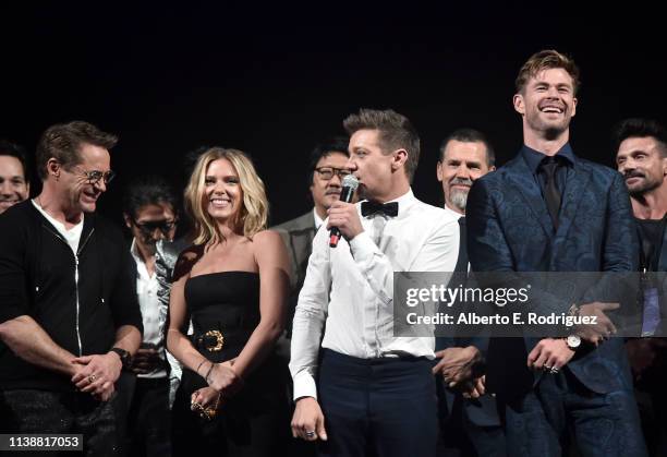 Robert Downey Jr., Scarlett Johansson, Jeremy Renner, and Chris Hemsworth speak onstage during the Los Angeles World Premiere of Marvel Studios'...