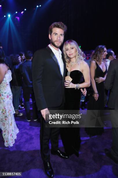 Liam Hemsworth and Miley Cyrus attend the Los Angeles World Premiere of Marvel Studios' "Avengers: Endgame" at the Los Angeles Convention Center on...