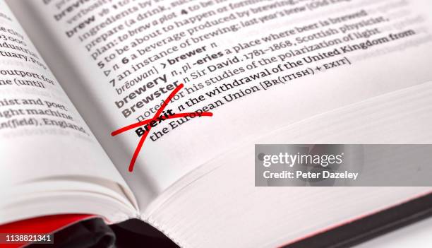 brexit text crossed out in dictionary - article 50 of the treaty on european union stock pictures, royalty-free photos & images