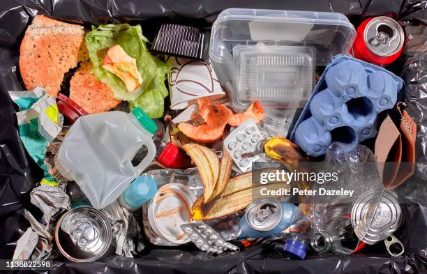 rubbish in bin unsorted - pollution stock pictures, royalty-free photos & images