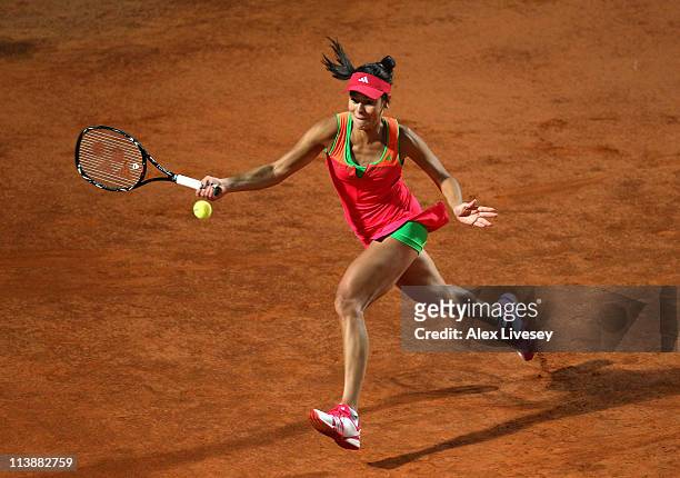 Ana Ivanovic of Serbia stretches for the ball during her first round match against Nadia Petrova of Russia during day two of the Internazionali BNL...