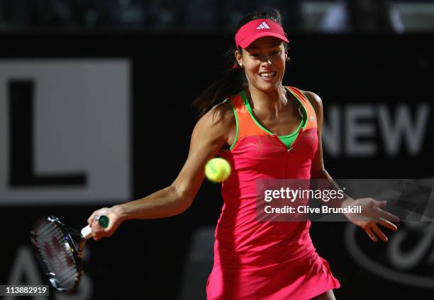 Ana Ivanovic of Serbia plays a forehand during her first round match against Nadia Petrova of Russia during day two of the Internazoinali BNL...