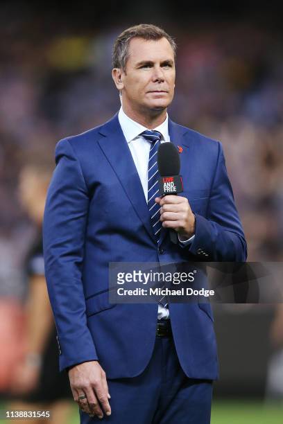 Television commentator Wayne Carey is seen during the AFL Round match between Richmond v Collingwood at Melbourne Cricket Ground on March 28, 2019 in...