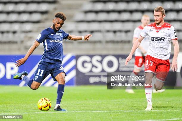 Fabien Ourega of Paris FC and Julien Masson of Valenciennes during the Ligue 2 match between Paris FC and Valenciennes FC at Stade Charlety on April...