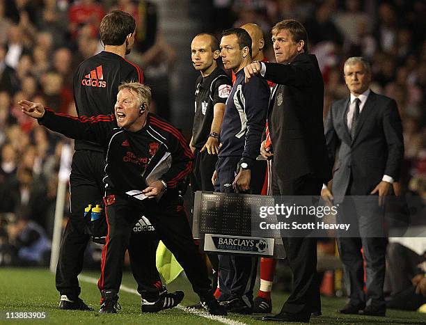 Assistant Sammy Lee and Manager Kenny Dalglish of Liverpool give instructions from the touchline during the Barclays Premier League match between...