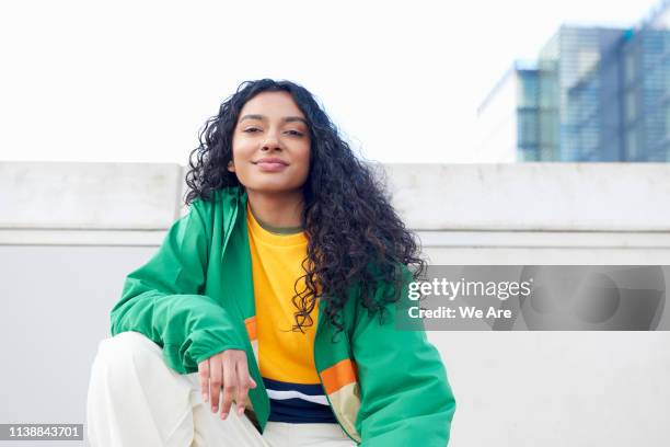 portrait of woman in city street - youth culture 個照片及圖片檔