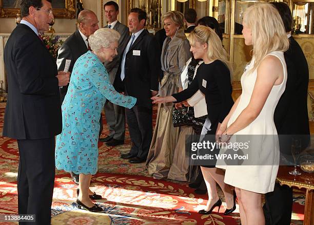 Queen Elizabeth II meets with Duffy at a performing Arts reception at Buckingham Palace on May 9, 2011 in London, England.