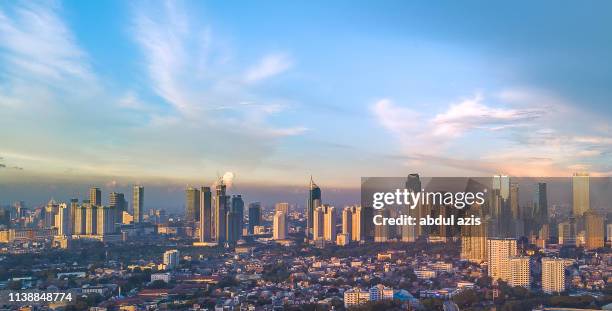 jakarta central business district golden hour - jakarta stock pictures, royalty-free photos & images