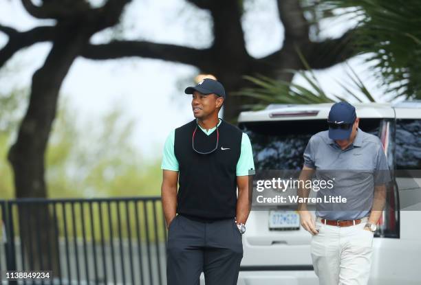 Tiger Woods of the United States arrives for his match against Brandt Snedeker of the United States during the second round of the World Golf...