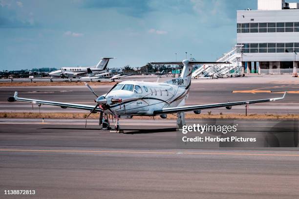 pilatus pc-12ng - pr-ber - azul  - aircraft used by the maintenance team to rescue aircraft with loops at airports - during the party ceremony - azul 10 years - small plane stock pictures, royalty-free photos & images