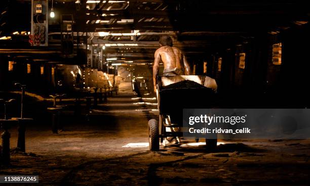 miner working at a mine - miner stock pictures, royalty-free photos & images