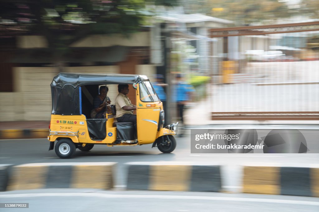 Tuktuk is a local transportation vehicle, on the road in Hyderabad.