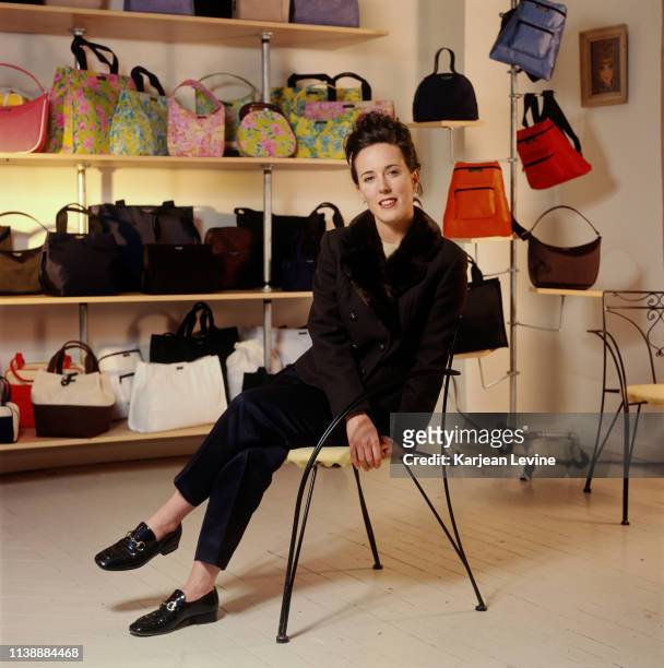 Handbag designer Kate Spade poses for a portrait with her latest collection on January 10, 1996 in New York City, New York.