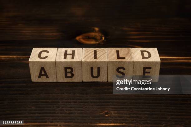 child abuse words on wooden blocks - porr bildbanksfoton och bilder