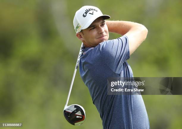 Aaron Wise of the United States plays his shot from the third tee in his match against Patrick Cantlay of the United States during the second round...