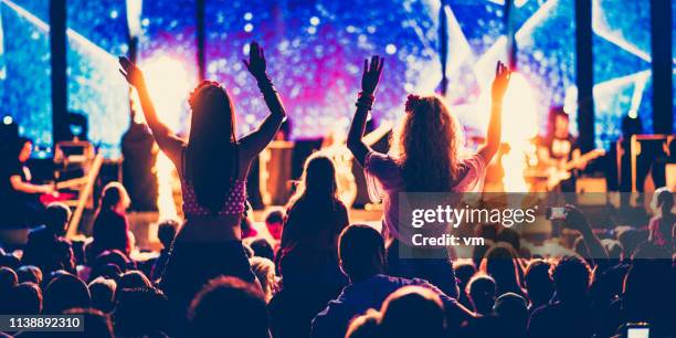 psychedelic rock concert crowd - rock band stock pictures, royalty-free photos & images