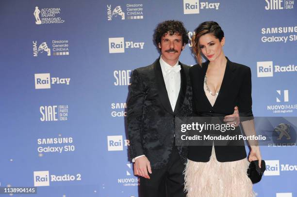 Italian television host Andrea Delogu and Italian actor Francesco Montanari during the red carpet of the 64th edition of the David di Donatello. Rome...