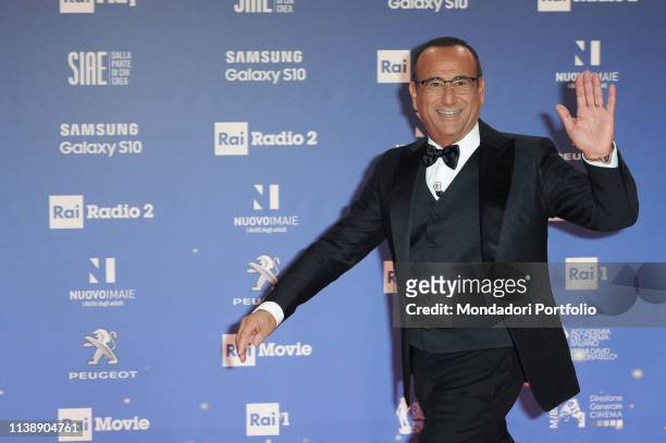 Italian television host Carlo Conti during the red carpet of the 64th edition of the David di Donatello. Rome , March 27th, 2019
