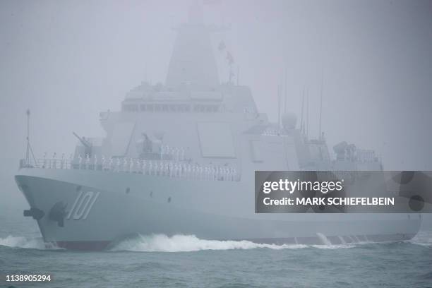 The new type 055 guide missile destroyer Nanchang of the Chinese People's Liberation Army Navy participates in a naval parade to commemorate the 70th...