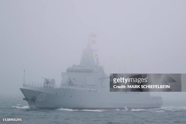 The new type 055 guide missile destroyer Nanchang of the Chinese People's Liberation Army Navy participates in a naval parade to commemorate the 70th...