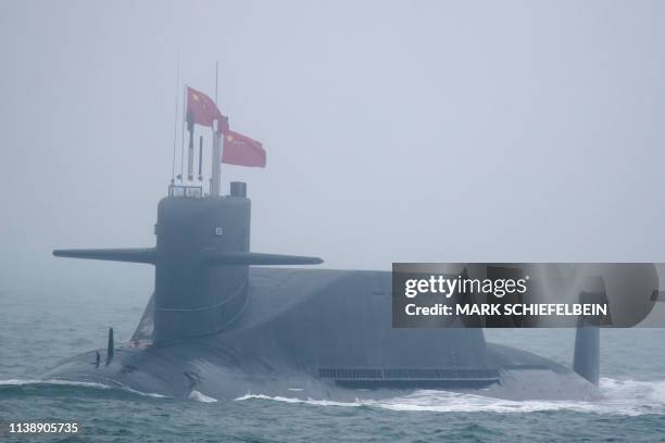 New type 094A Jin-class nuclear submarine Long March 10 of the Chinese People's Liberation Army Navy participates in a naval parade to commemorate...