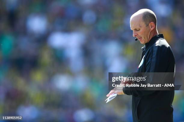 Mike Dean during the Premier League match between Huddersfield Town and Watford FC at John Smith's Stadium on April 20, 2019 in Huddersfield, United...