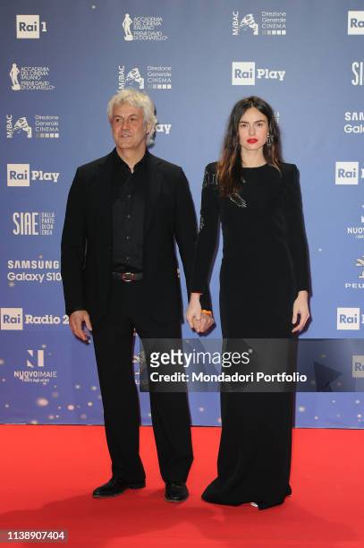 Polish model and actress Kasia Smutniak and Italian film producer Domenico Procacci during the red carpet of the 64th edition of the David di...