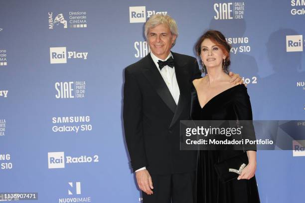 Italian actress Elena Sofia Ricci with her husband, Italian compositor and conductor, Stefano Mainetti during the red carpet of the 64th edition of...