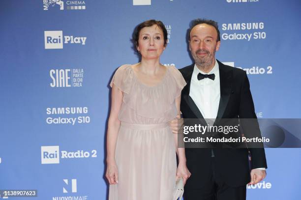 Italian actor, comedian, director and screenwriter Roberto Benigni with his wife, actress and Italian film producer, Nicoletta Braschi during the red...