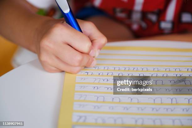 Kid Learning Cursive Learn Cursive Alphabet Photos and Premium High Res Pictures - Getty Images