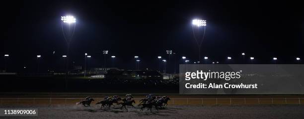 Runners race down the back straight at Chelmsford City Racecourse on March 28, 2019 in Chelmsford, England.