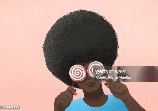 portrait woman with afro holding lollipops over eyes - portraits of people color background stock illustrations