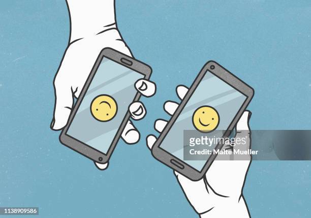 view from above smiley faces on smart phones - smart communicate elevation view stock-grafiken, -clipart, -cartoons und -symbole