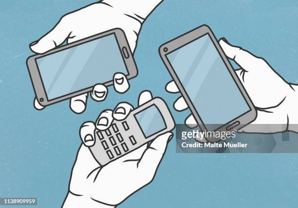 view from above hands holding cell phone and smart phones - horizontal stock-grafiken, -clipart, -cartoons und -symbole