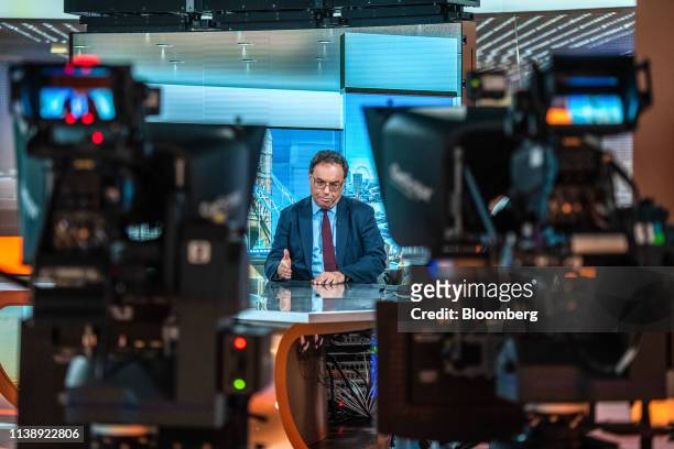 Andrew Bailey, chief executive officer of Financial Conduct Authority, gestures while speaking a Bloomberg Television interview in London, U.K., on...