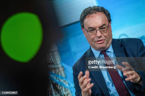 Andrew Bailey, chief executive officer of Financial Conduct Authority, gestures while speaking during a Bloomberg Television interview in London,...