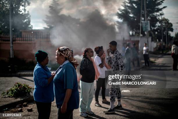 Protesters gather in the streets of Johannesburg, on April 23, 2019 during a protest against the lack of service delivery or basic necessities such...