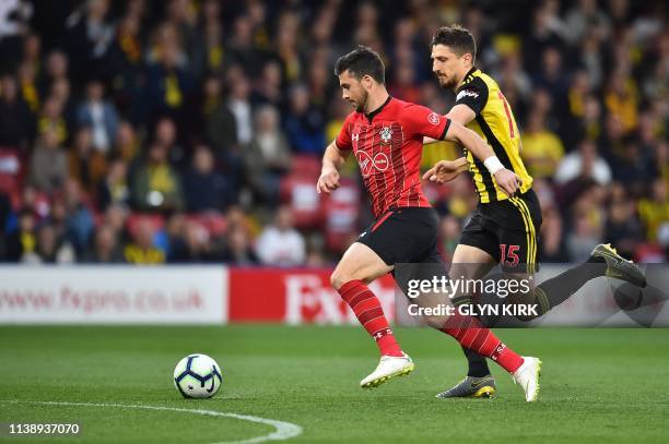 Southampton's Irish striker Shane Long runs to score the opening goal during the English Premier League football match between Watford and...