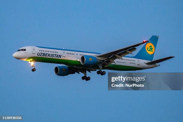 Uzbekistan Airways Boeing 757-200 airplane with registration UK75701 is landing at London Heathrow International Airport in England, UK in the...