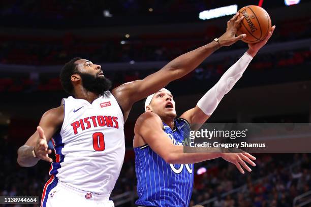 Aaron Gordon of the Orlando Magic gets his shot blocked by Andre Drummond of the Detroit Pistons during the first half at Little Caesars Arena on...