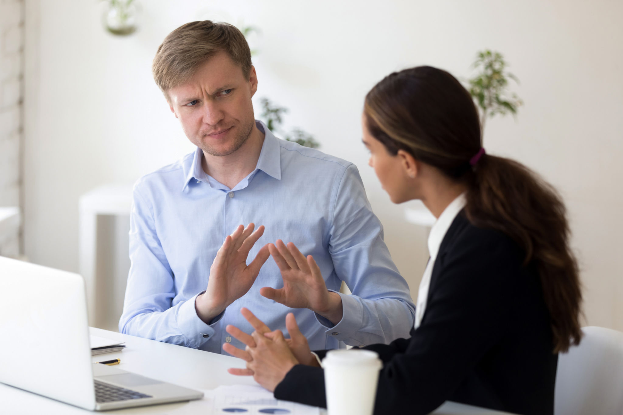 Millennial businessman rejecting giving interview to journalist Millennial businessman rejecting giving interview to journalist