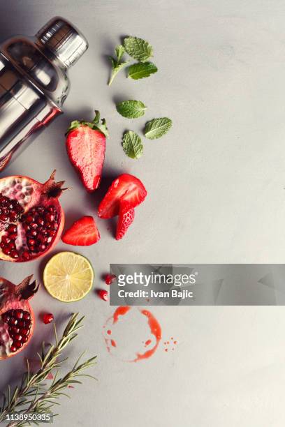 red fruit cocktail - cocktail making stock pictures, royalty-free photos & images