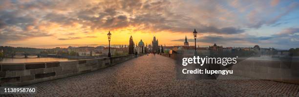 charles bridge at dawn,prague - czech republic skyline stock pictures, royalty-free photos & images