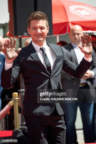 Actor Jeremy Renner attends the Marvel Studios' 'Avengers: Endgame' cast place their hand prints in cement at TCL Chinese Theatre IMAX Forecourt on...