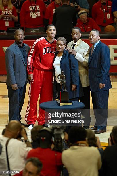 Playoffs: Chicago Bulls Derrick Rose with family and Maurice Podoloff MVP Trophy before game vs Atlanta Hawks at United Center. Game 2. Chicago, IL...